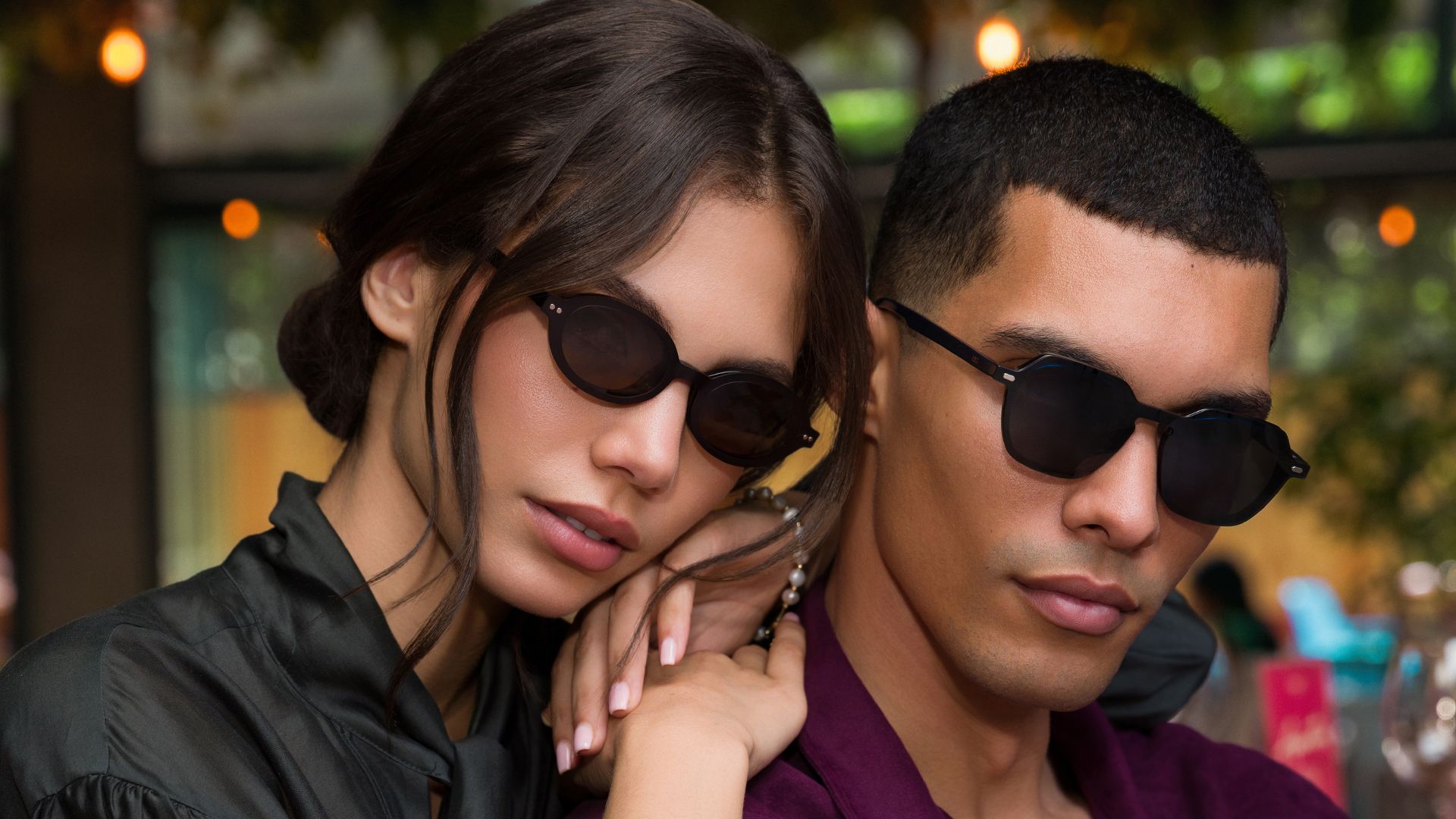 Couple wearing Biaggi round and square sunglasses
