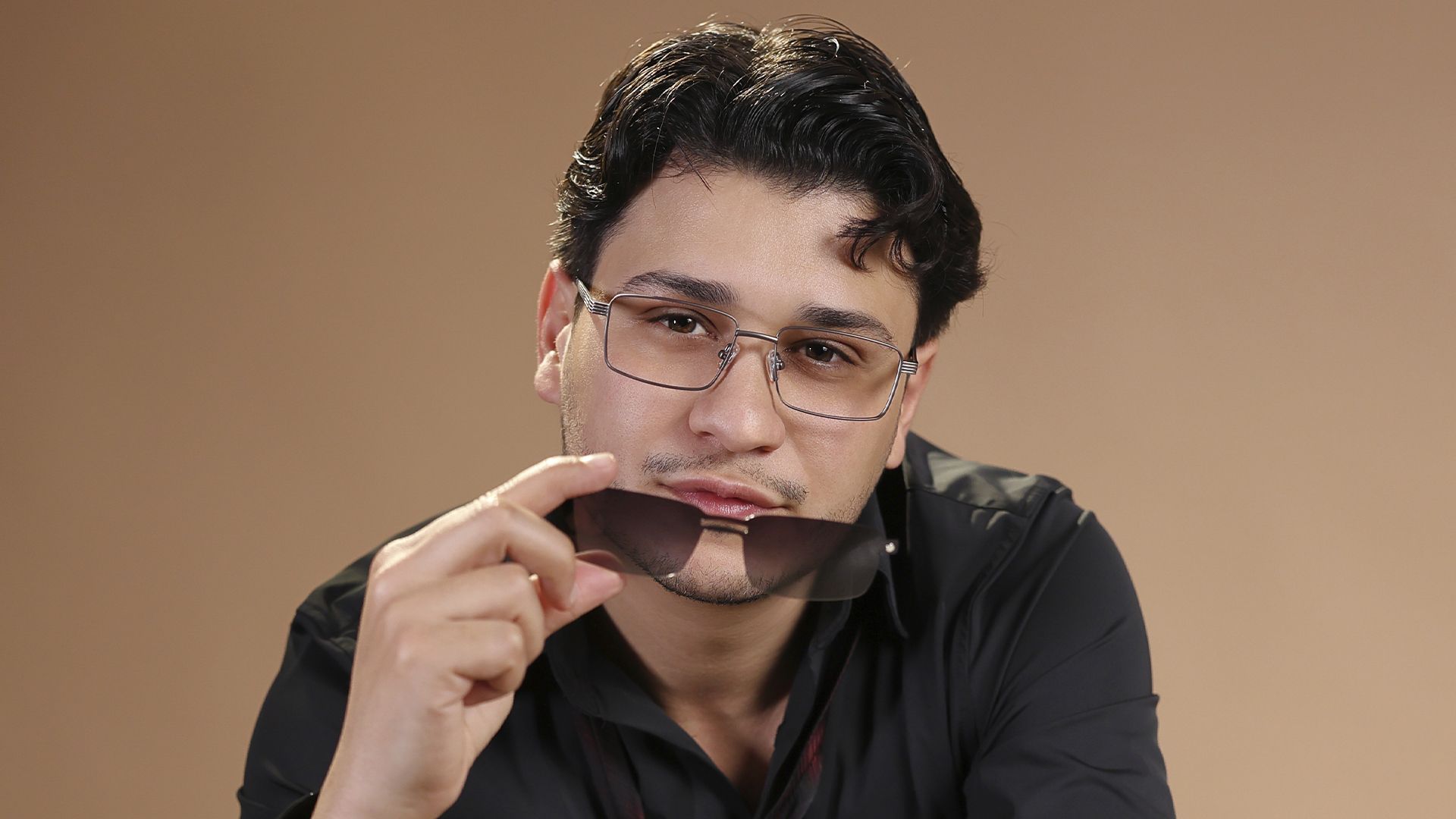 Rabii Skalli holding a Biaggi clip-on sun lens