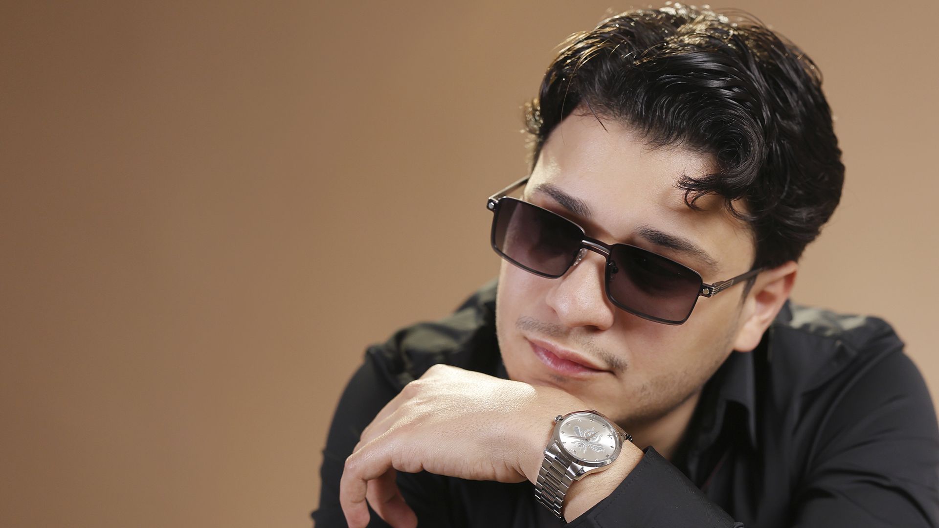 Rabii Skalli wearing Biaggi rectangular sunglasses